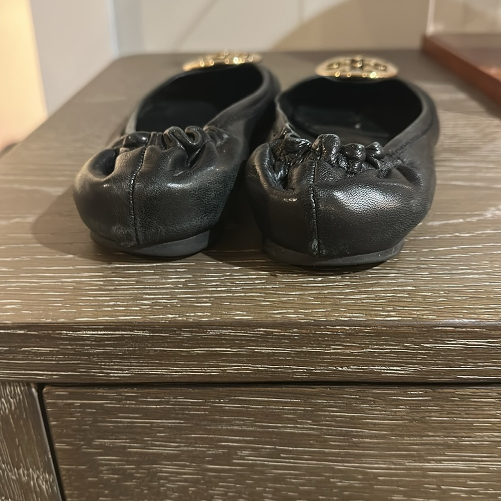Tory Burch Black Flats with Gold Medallion - Picture 5 of 6